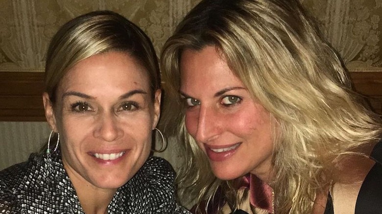 Cat Cora and Nicole Ehrlich in a booth