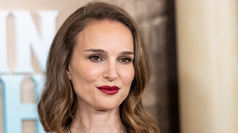 Natalie Portman poses in red lipstick