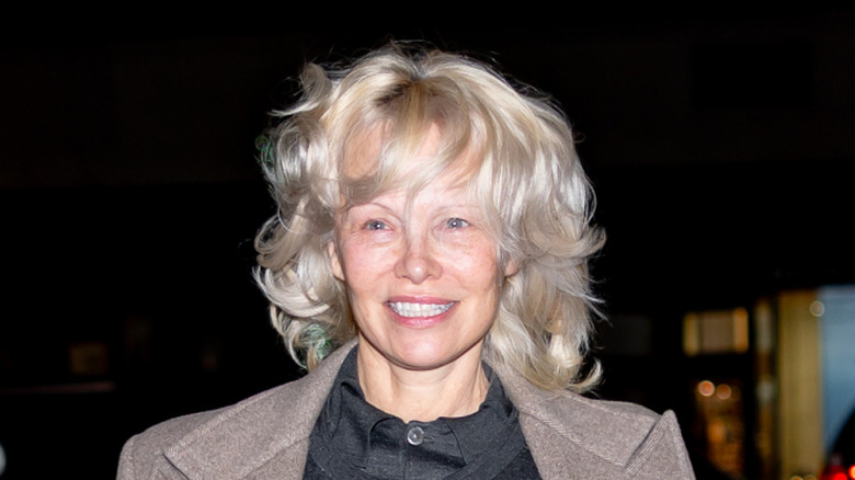 Actress Pamela Anderson at night