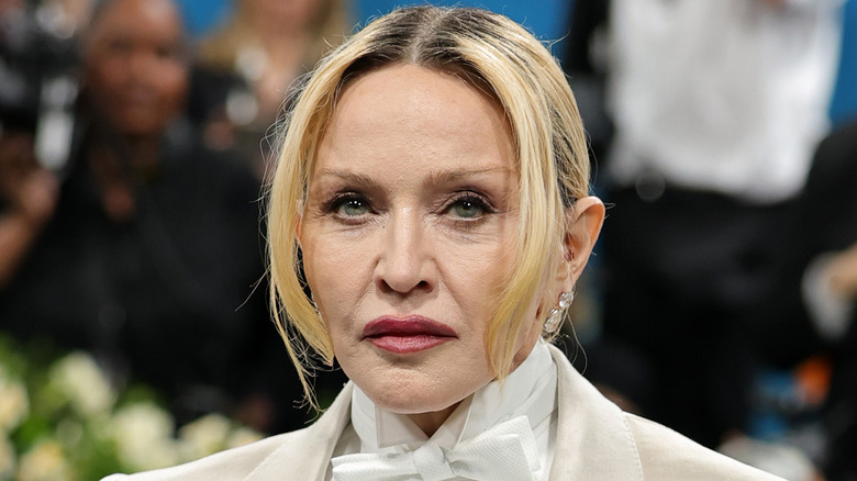 Madonna posing for cameras at publicity event