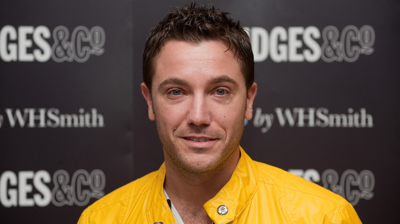 celebrity chef Gino D'Acampo posing for cameras