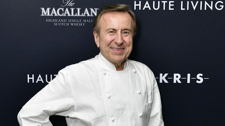 Daniel Boulud with blue backdrop