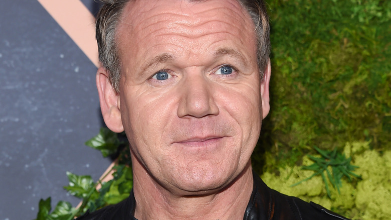 Gordon Ramsay in front of plants