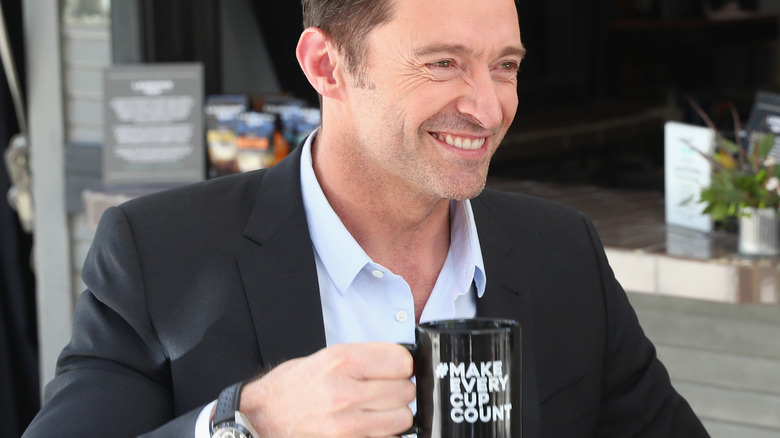 Hugh Jackman drinking coffee