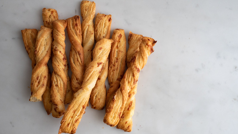 The classic Italian-inspired breadsticks on white surface