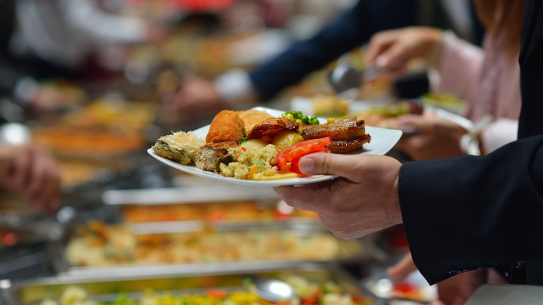 Plate of food over buffet