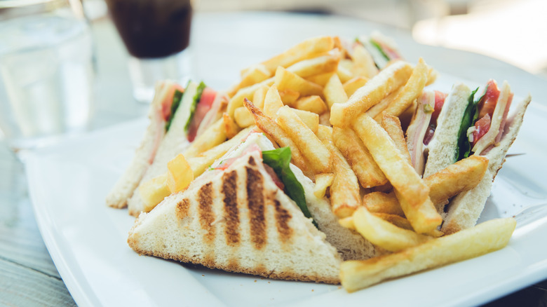 Club sandwich with french fries