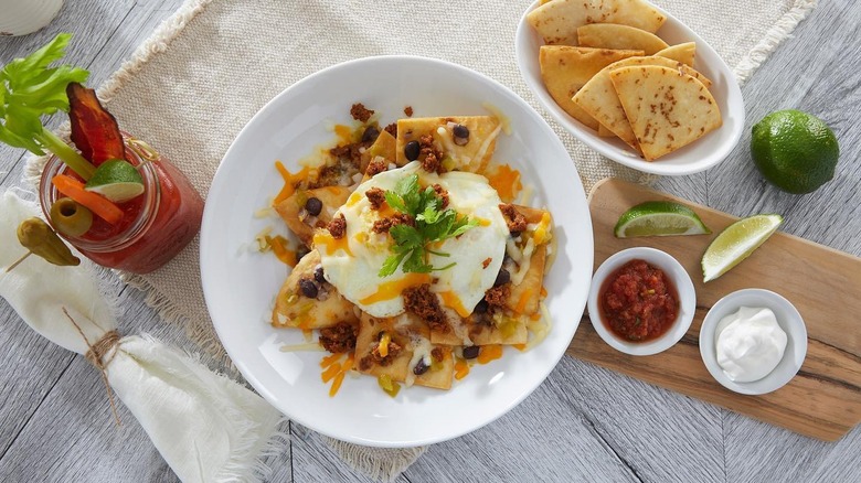 huevos rancheros with bloody mary drink