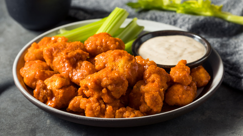 Wings and celery with ranch dressing