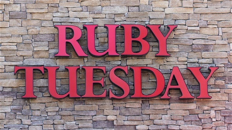 Ruby Tuesday sign on brick wall
