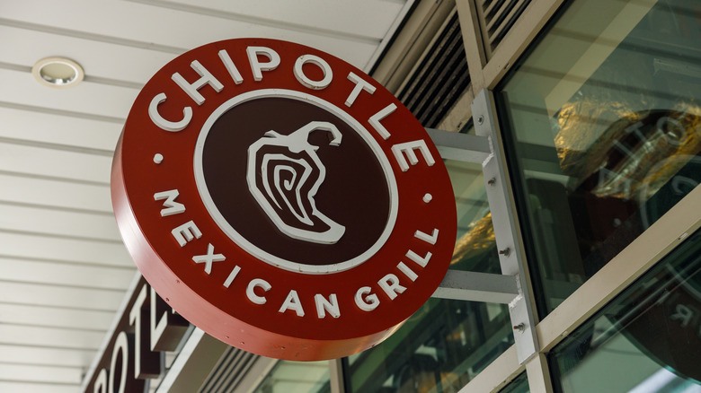 Signage showing the Chipotle restaurant logo