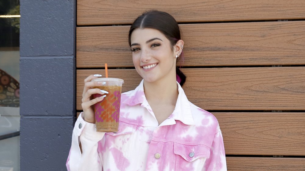 Charli D'Amelio with her Dunkin' drink