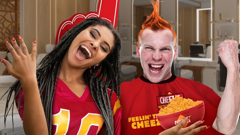 people smiling in football jerseys