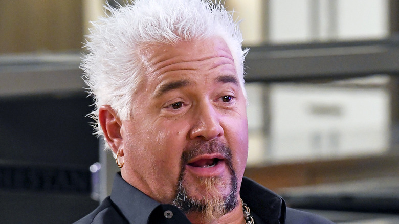 Guy Fieri in a kitchen