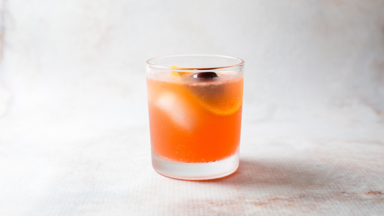 orange cocktail on marble table