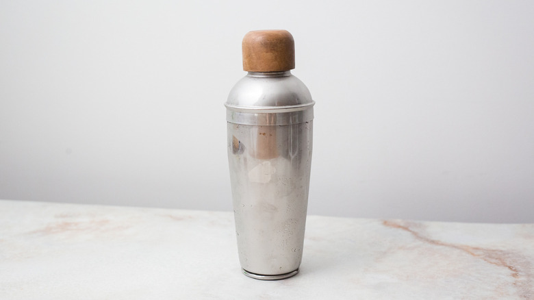 cold cocktail shaker on table