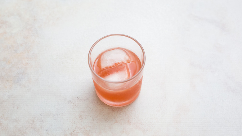 pink cocktail on marble table