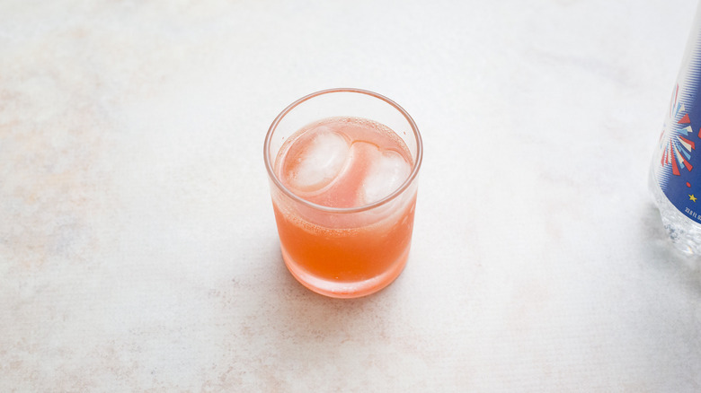 pink cocktail on marble table