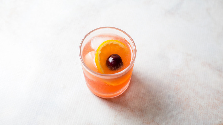 pink cocktail on marble table