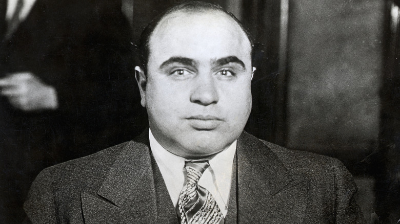 Black and white photo of Al Capone looking at camera