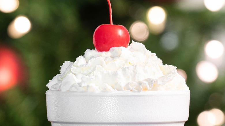 whipped cream and a cherry