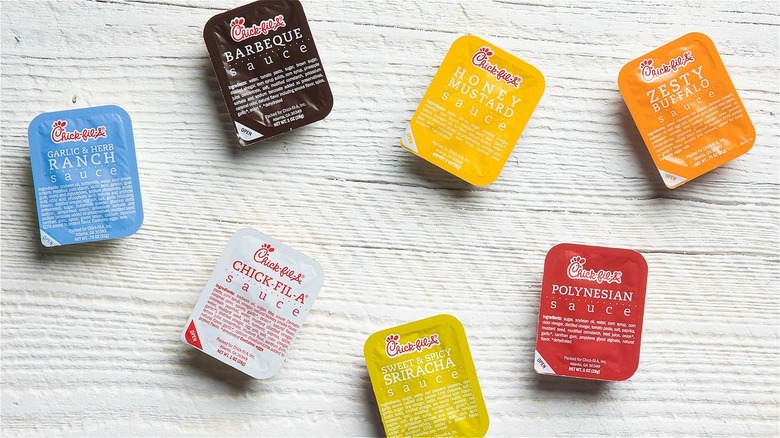 Assortment of Chick-fil-A condiment packages