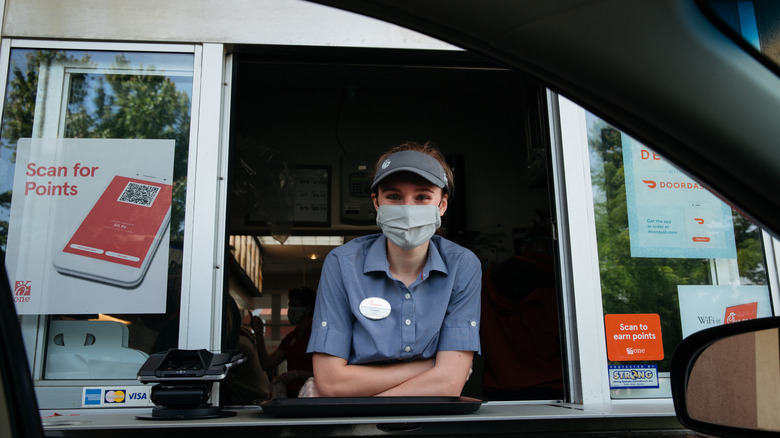Chick-fil-A employee at drive-thru window