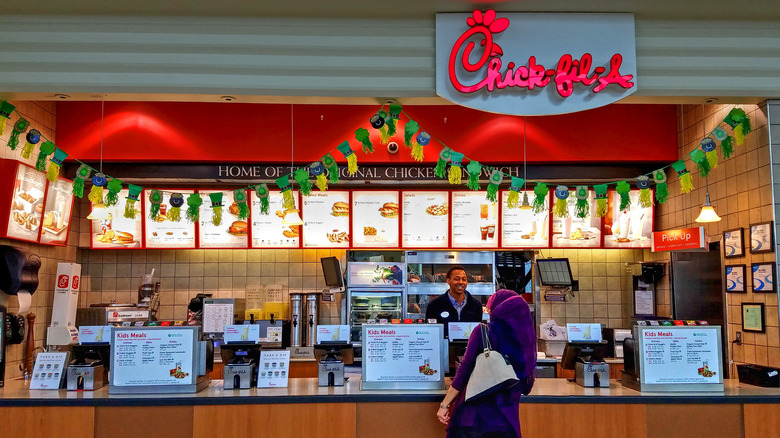 Customer at Chick-fil-A counter