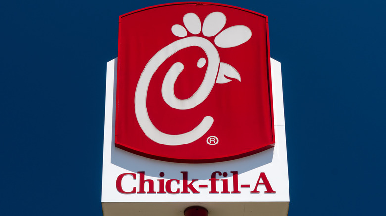 Chick-fil-A sign against dark blue sky