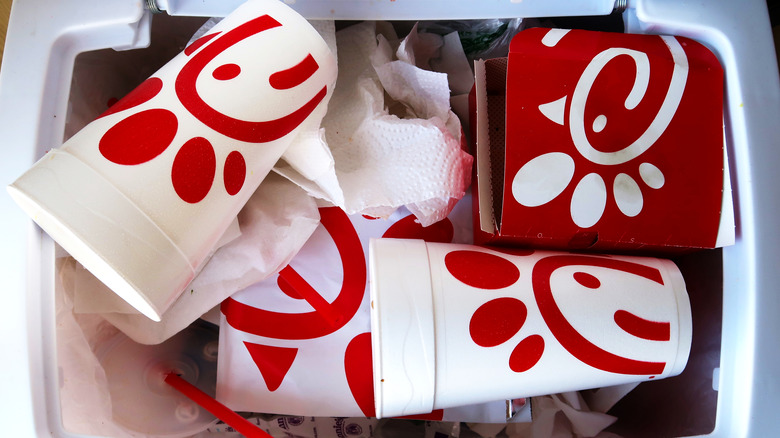 Chick-fil-A containers in trash bin