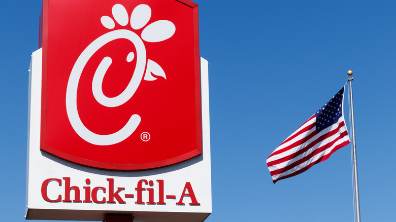 Chick-fil-A sign against blue sky