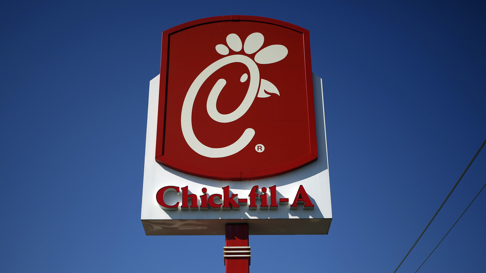 Chick-fil-A sign against blue sky
