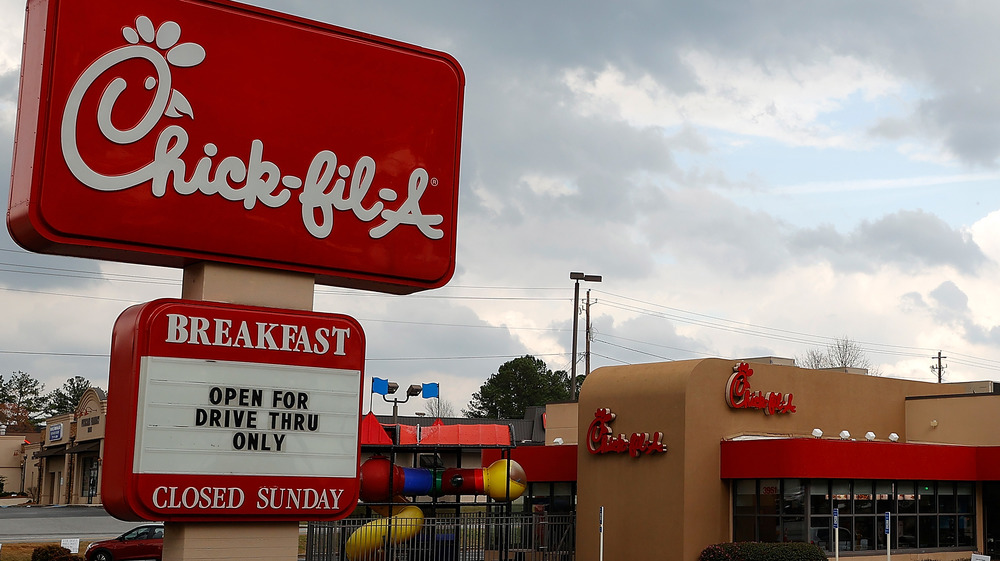 Chick-fil-A with "open for drive thru only" on readerboard