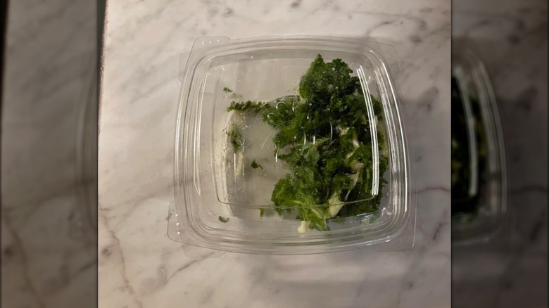 Kale in plastic container