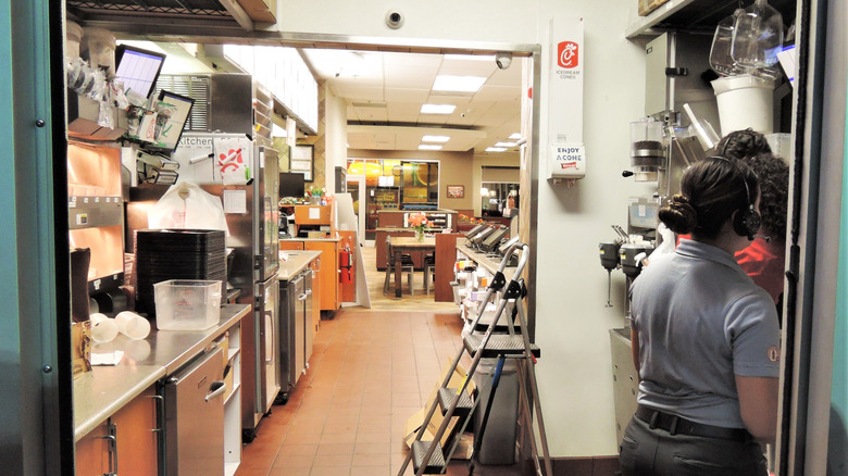 Chick-fil-a workers in kitchen