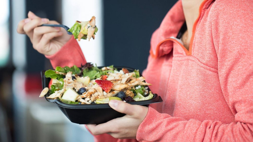 Person eating Chick-fil-A salad