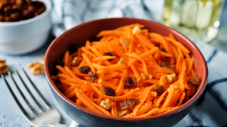 Bowl of carrot and raisin salad