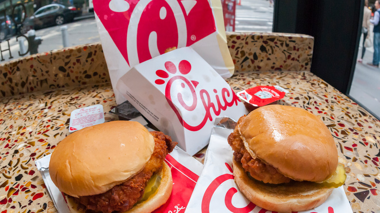 Chick-fil-A store front with sign that says "closed Sunday"