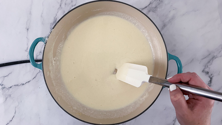 stirring roux in pot