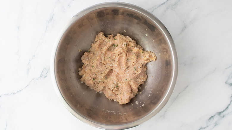 Chicken meatball mixture in bowl