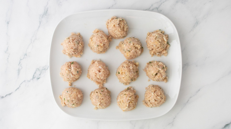 Chicken meatball portions on plate