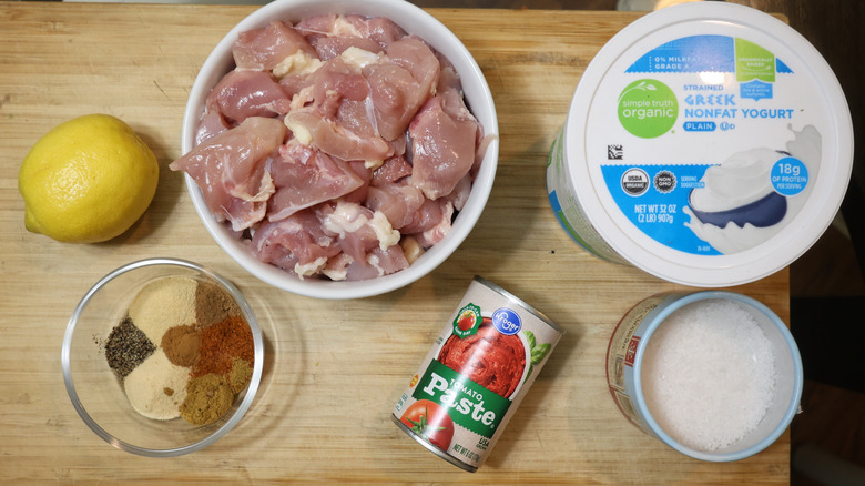 chicken kebab ingredient laid out on a cutting board