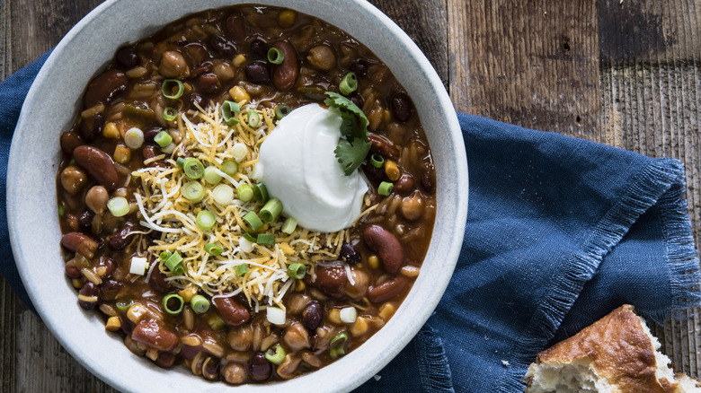 A large bowl of ground beef and bean chili.