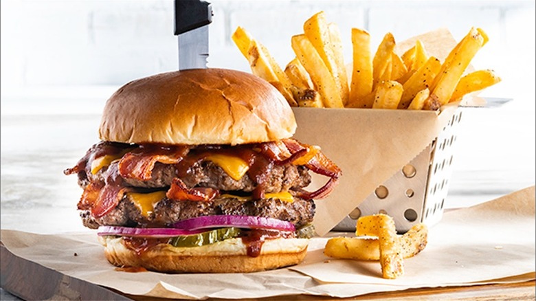 A Big Bacon BBQ Burger and fries