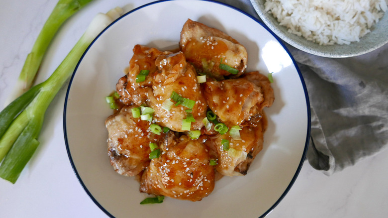 cooked chicken thighs with scallions