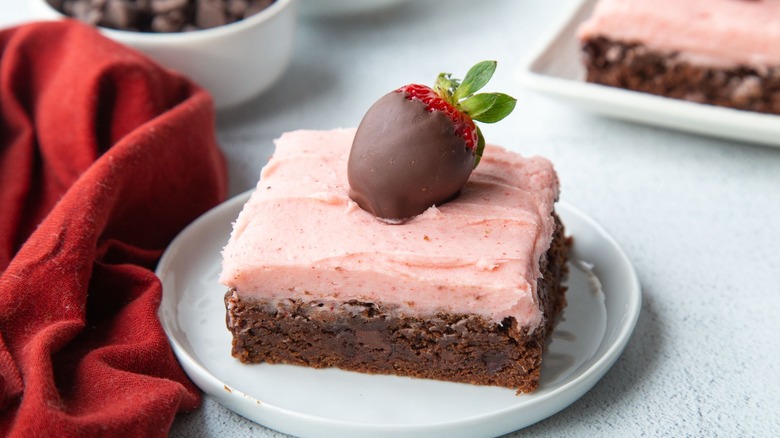 strawberry frosted brownie on plate