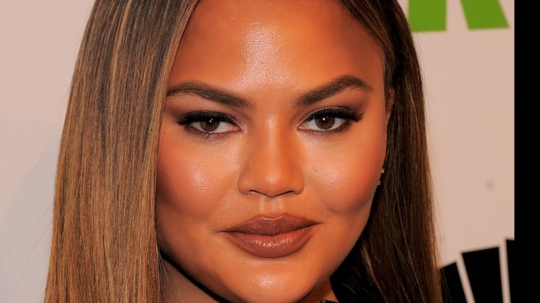 Chrissy Teigen stares in close-up