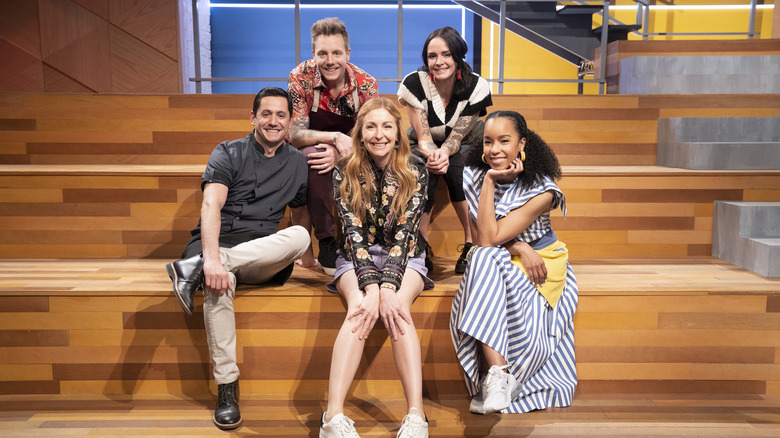 Christophe, Gonzo, Christina, Ashley, and Maya-Camille smiling on Bake Squad set