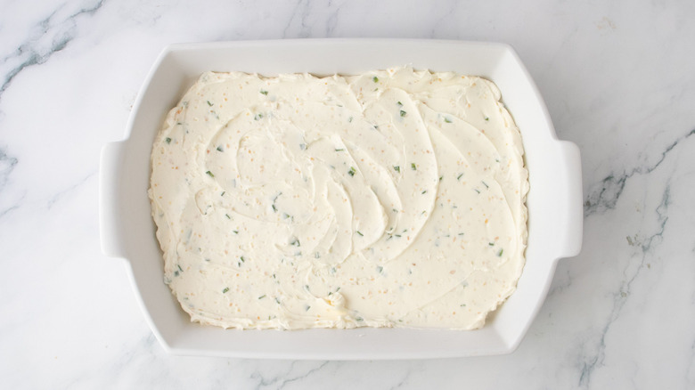 Jalapeño cream cheese layer spread out in casserole dish