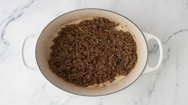 Cooked ground beef in large pot